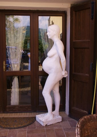 Life size sculpture of pregnant woman